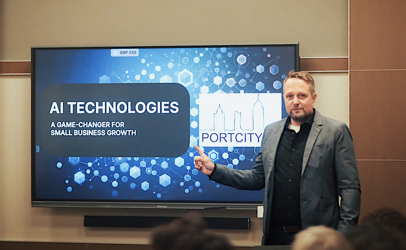 Dominik speaking at an event